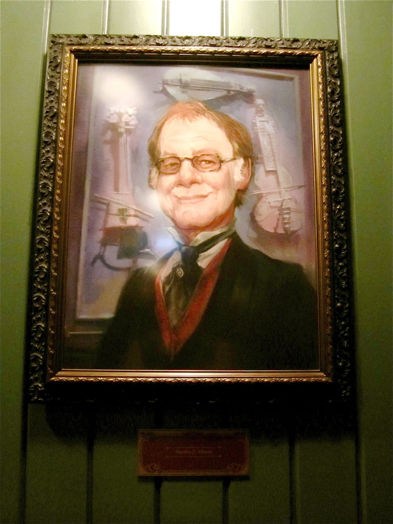 Danny Elfman's musical contribution immortalised in a portrait in the Mystic Manor ride waiting room of Hong Kong Disneyland