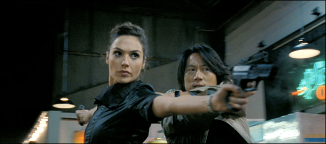 Gal Gadot (Gisele) and Sung Kang (Han) in Fast & Furious 6