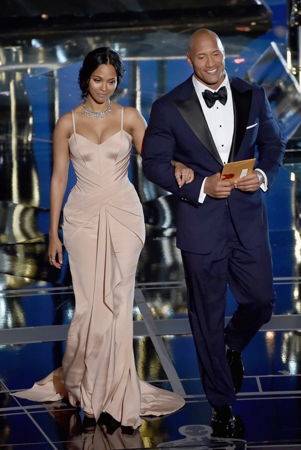Zoe Saldana and The Rock as presenters at the 87th Annual Academy Awards. (Kevin Winter/Getty Images)