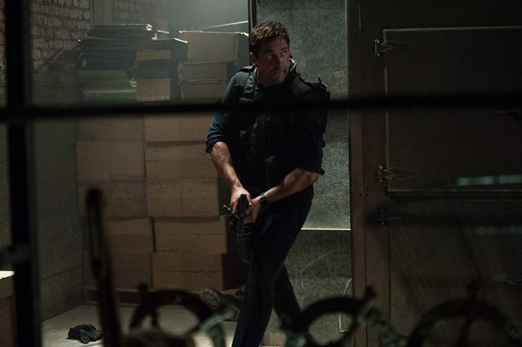 Gerard Butler as former Secret Service agent Mike Banning on his one-man avenging quest in Olympus Has Fallen